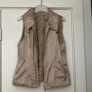 Cabi Reversible vest. Faux fur or sleek satin